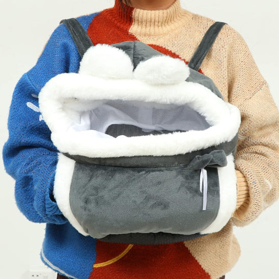 sac de transport pour chien gris avec des poches pour chauffer les mains en hiver