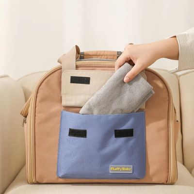 Sac de transport pour chien avec des poches sur les côtés